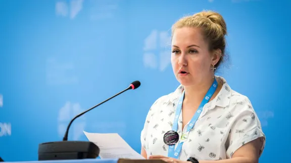 Ms Vera Tkach, chairperson of the Ad-hoc Committee for Advocacy and Public Voice, presents the resolution on Nigeria to the LWF council. Photo: LWF/ Albin Hillert