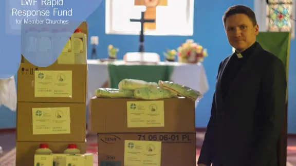 The Lutheran Church in Grodno, Belarus, Rev. Vladimir Tatarnikov stands with supplies purchased with LWF COVID-19 Rapid Response Funds. Photo: The Lutheran Church in Grodno