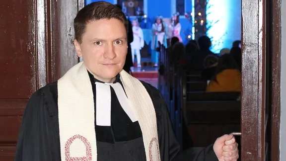 Pastor Vladimir Tatarnikov at the door of St. Johnâs Lutheran Church in Grodno, Belarus. Photo: Oleg Shreders