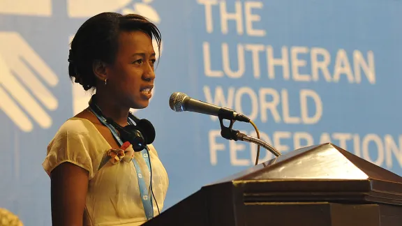 Mami Brunah Aro Sandaniaina of the Malagasy Lutheran Church asks the Council how their churches engage young people who have taken part in LWF youth programs. Photo: LWF/M. Renaux