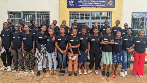 Participants in the Lutheran Church of Rwanda ‘Sparks of Peace’ youth initiative engage in community work. Photo: LCR/ Geoffrey Munyaneza