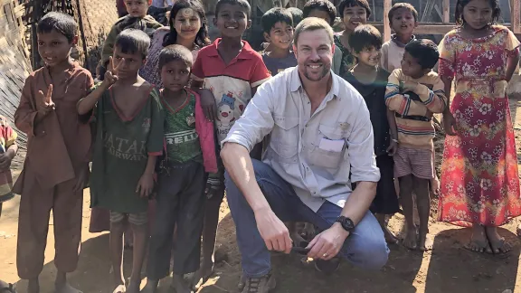 Mattner with Rohingya children in an DP camp in Myanmar, 2016. Photo: LWF 