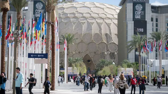 30 November 2023, Dubai, United Arab Emirates: People begin to gather at Expo City in Dubai, venue for COP28, the United Nations climate summit 2023. Photo: LWF/Albin Hillert