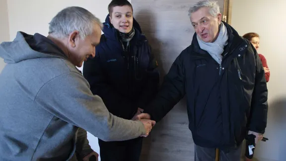 Visit with a family whose apartment was renovated by LWF. Photo: Photo: LWF/ Anatolyi Nazarenko