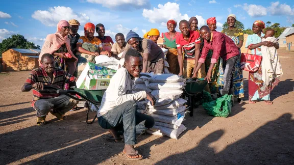 One of the cooperatives supported by LWF proudly show their harvest. Photo: LWF/ L. Gillabert