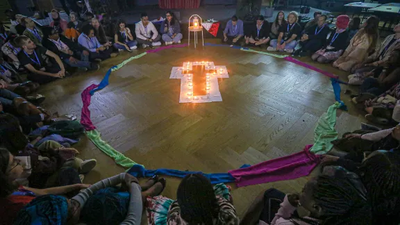 Participants from the LAC region lead evening devotion at the September 2023 LWF Youth Pre-Assembly in Wisła Malinka, Poland. Photo: LWF/Johanan Celine Valeriano