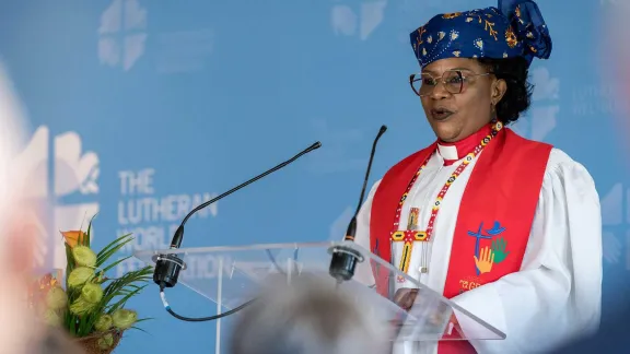 Cameroonian pastor Rev. Dr Jeannette Ada Epse Maina, delivering the sermon at the opening service of the 2024 Council meeting at Chavannes-de-Bogis, near Geneva, Switzerland. Photo: LWF/Albin Hillert