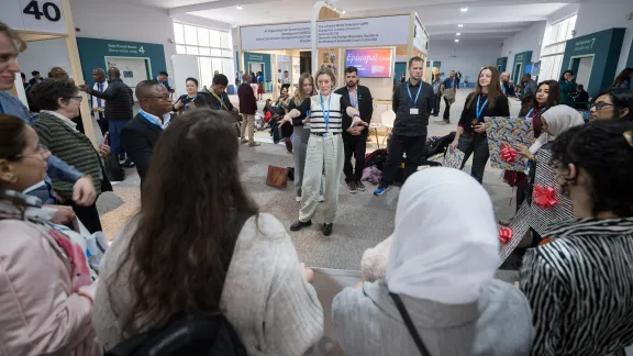 Savanna Sullivan leads preparations for an advocacy action by ecumenical and interfaith partners at COP29 in Baku, Azerbaijan. Photo: LWF/Albin Hillert