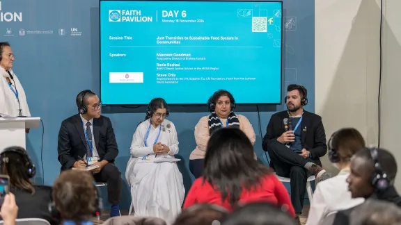 Romario Dohmann speaks at an interfaith side-event during the climate summit in Baku. Photo: LWF/Albin Hillert