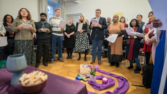 Participants gather for opening worship at the 9 to 11 December Gender Justice Consultation