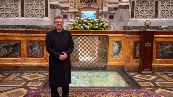 Prof. Dirk Lange beside the Apostle’s tomb in the Roman Basilica of Saint Paul Outside the Walls for the closing of the 2024 Week of Prayer for Christian Unity. Photo: CatholicPressPhoto/A. Giuliani