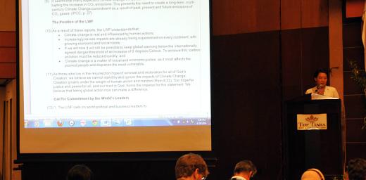 Mikka McCracken presents the report of the Committee for Advocacy and Public Voice at Council 2014. Photo: LWF/M. Renaux