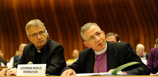 LWF President Bishop Dr Munib A. Younan (right) addressing the UNHCR Dialogue meeting with faith leaders, on the left is LWF General Secretary Rev. Martin Junge. Â© LWF/Peter Williams