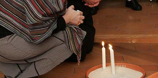 Participants light candles during morning prayer at a past LWF consultation on theology in the life of Lutheran churches. Â© LWF/D.-M. GrÃ¶tzsch