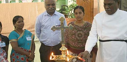 UELCI Executive Secretary Rev. Dr Augustine A. G. Jeyakumar (far right) lights a lamp to inaugurate the YMR 2013 conference in Chennai. Others joining in the symbolic action included (from left to right) Augustina Gerson, Ms Vasuki Jesudoss, Mr J. S. Anbu; and Annes Brida Rose. Â© UELCI