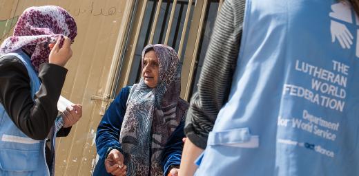 LWF humanitarian workers assist a woman in the Middle East. Photo: Christian Jepsen