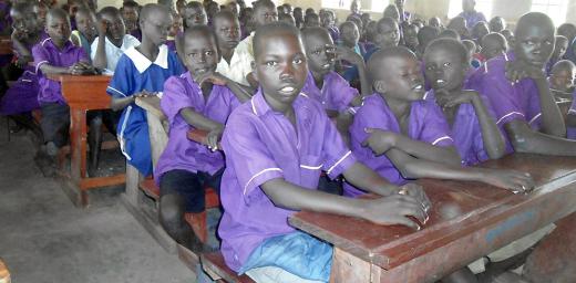 Emmanuel sits in class, supported by the LWF and safe from the violence he fled in South Sudan. Photo: LWF Uganda