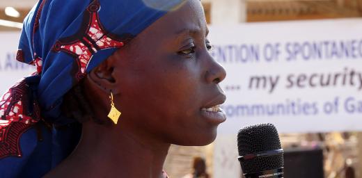 Aminatou Abubakar, president of the womenâs association in Minawao refugee camp, speaks at a public event about the dangers of spontaneous and unassisted return to Nigeria. Photo: LWF/ C. KÃ¤stner