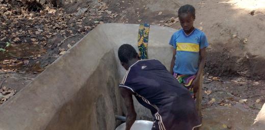 Drawing water from a source that was recently rehabilitated by the LWF in Nana MambÃ©rÃ©, Central African Republic. Photo: LWF/CAR