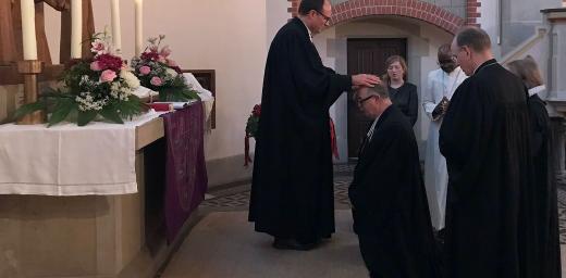 WÃ¼rttemberg Bishop Dr Frank O. July is installed as the new chairperson of the German National Committee, in Hanover, Germany. Photo: GNC