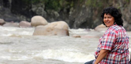 Berta Caceres stands at the Gualcarque River in the Rio Blanco region of western Honduras where she, COPINH (the Council of Popular and Indigenous Organizations of Honduras) and the people of Rio Blanco have maintained a two year struggle to halt construction on the Agua Zarca Hydroelectric project, that poses grave threats to local environment, river and indigenous Lenca people from the region. Photo: Tim Russo/Goldman Environmental Prize