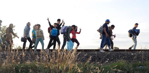 Refugees walking on the railways at the border between Hungary and Serbia. Photo: ELCH/ Zsuzsanna Horvath-Bolla