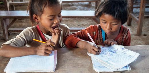 Caption: Vone and Viengkeo are eager students at the local school. Photo: LWF Laos