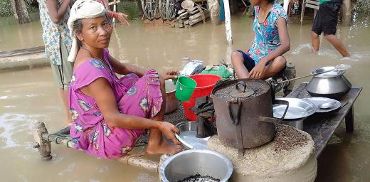 A woman from Bhajani Municipality, in Kailali district in the far western part of Nepal cooks food at waterlogged premises. Photos: LWF/ P. Maharjan 