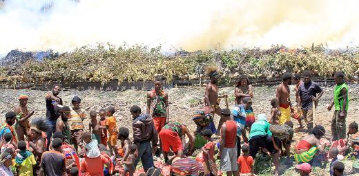 Burning the stone, originally a traditional Papuan way of cooking and also a thanksgiving ceremony, sometimes also the scene for harmful traditional practices. Photo: John Roy Purba/HKBP