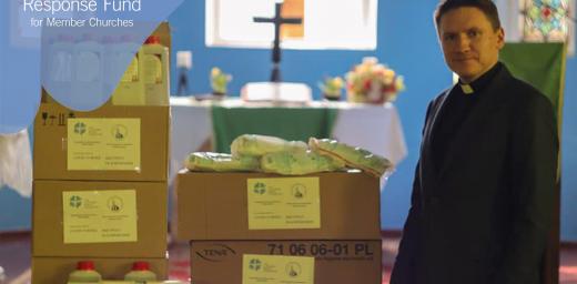 The Lutheran Church in Grodno, Belarus, Rev. Vladimir Tatarnikov stands with supplies purchased with LWF COVID-19 Rapid Response Funds. Photo: The Lutheran Church in Grodno