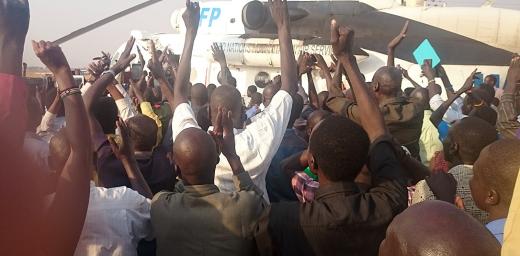 The returning LWF staff were welcomed by a crowd at Juba airport. Photo: LWF/E. Mpanya