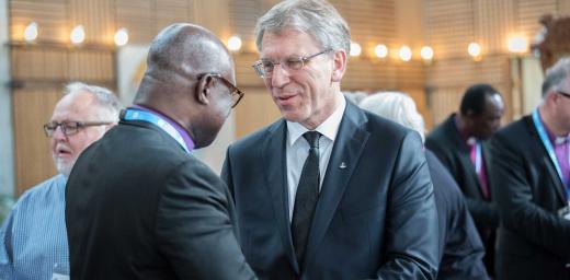 LWF President Musa and WCC General Secretary Tveit meeting at the LWF Council 2018 in Geneva. Photo: LWF/Albin Hillert
