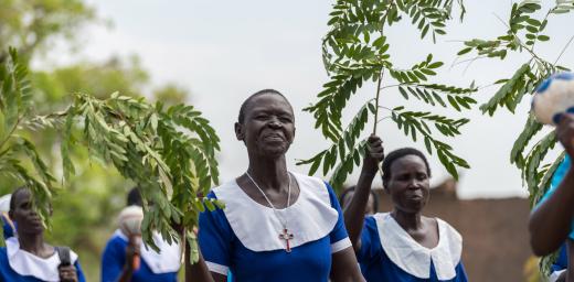 A group of women from the Kajo-Keji Diocese march to church in the refugee settlement of Palorinya in Obongi district, West Nile area of northern Uganda. All photos: LWF/Albin HillertÂ 