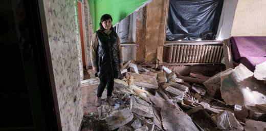 41-year-old Victoria Hlushko pictured in what used to be the living room of her family home in the village of Bil’machivka. Photo: LWF/ Albin Hillert