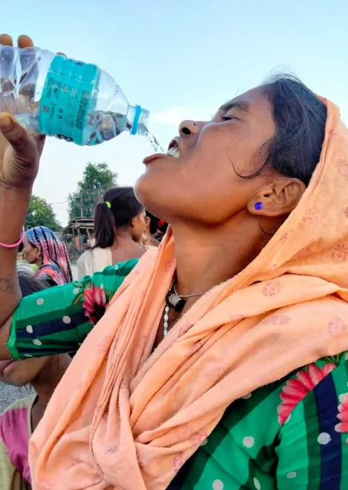 Safe drinking water was among the items distributed by LWF days after the floods. Photo: LWF Nepal